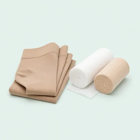 Graduated compression stockings beside sterile wound dressings