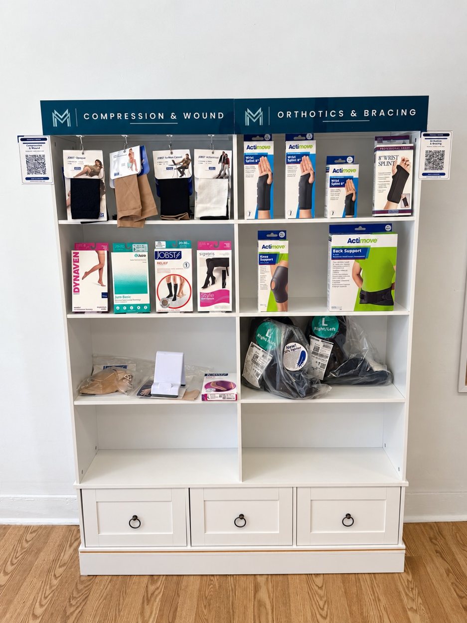 Shelving unit with compression, wound care and orthotics at the Medically Modern Mount Kisco store